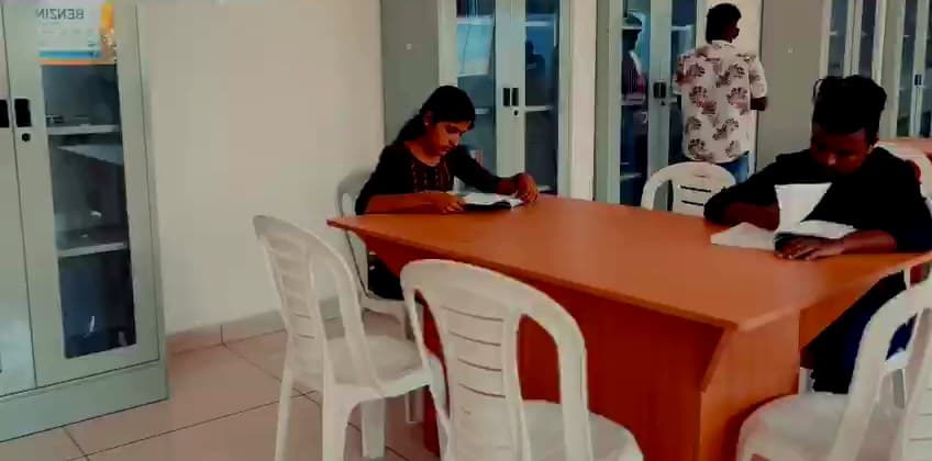 Students reading in the library